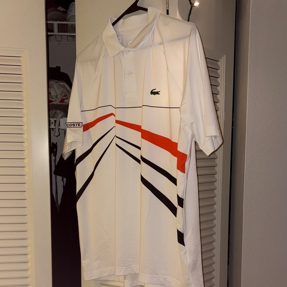 Lacoste Men's Polo Shirt with Orange and Black Accents